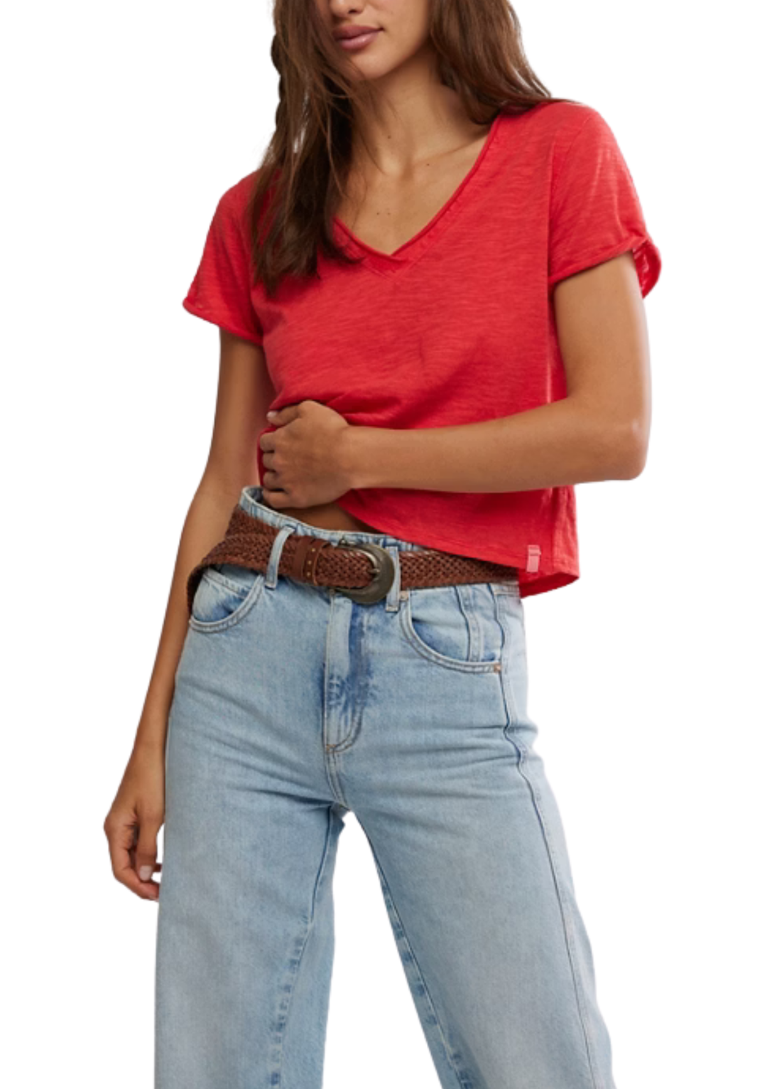 Person wearing a red top and light blue jeans on a white background