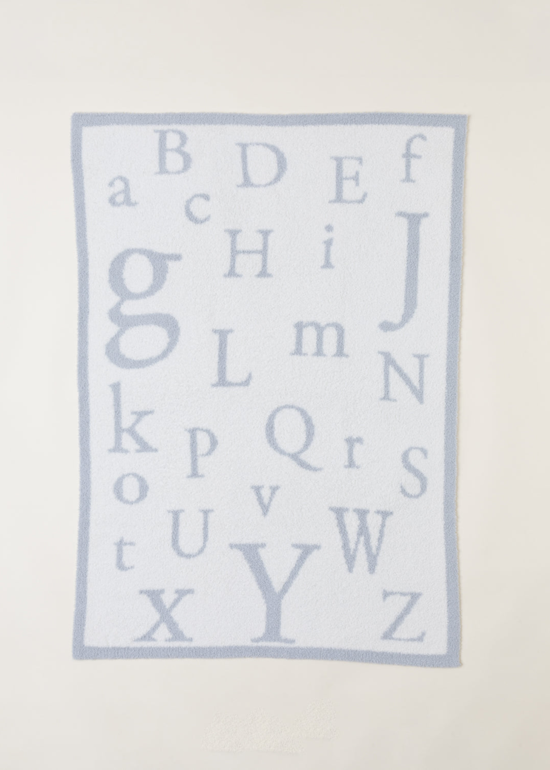 Blue and white ABC pattern blanket