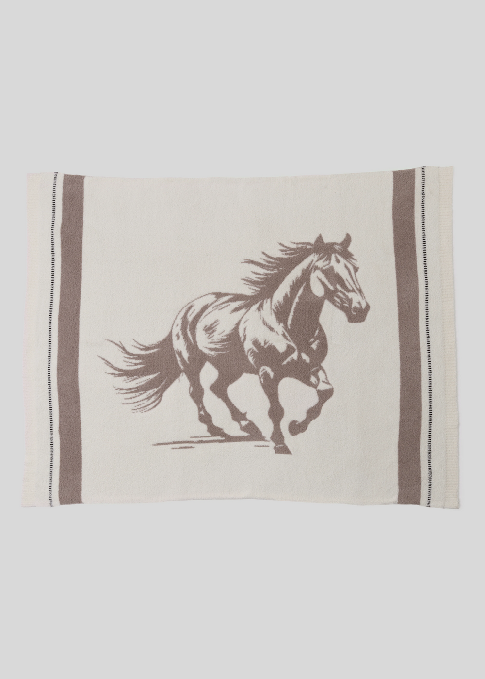 Cream blanket with a brown running stallion graphic and brown stripes
