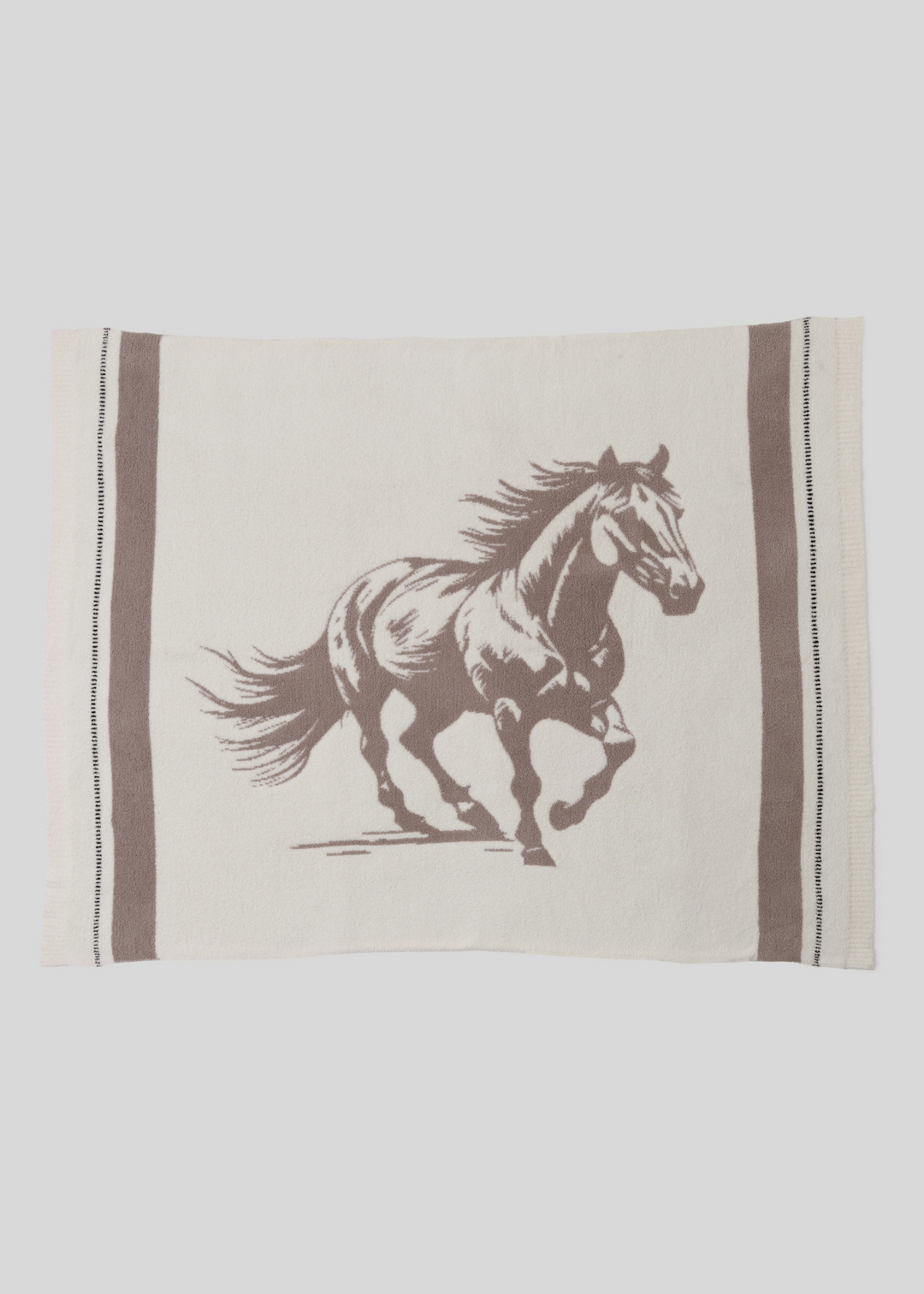 Cream blanket with a brown running stallion graphic and brown stripes