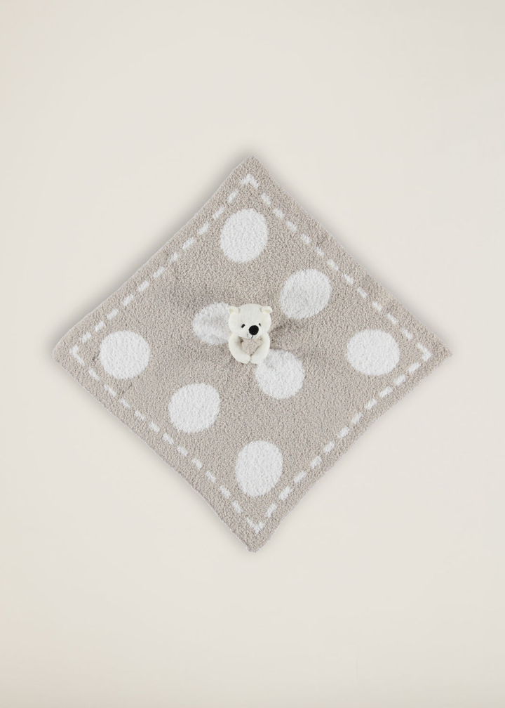 Stuffed animal attached to a brown blanket