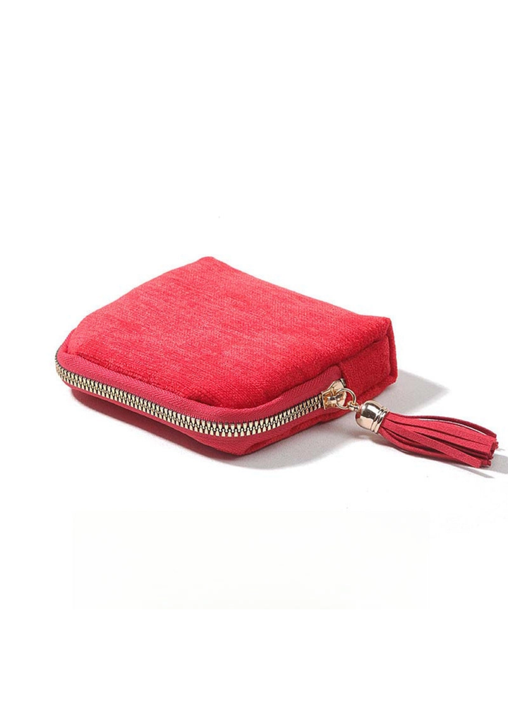 Velvet burgundy jewelry organizer on a white background