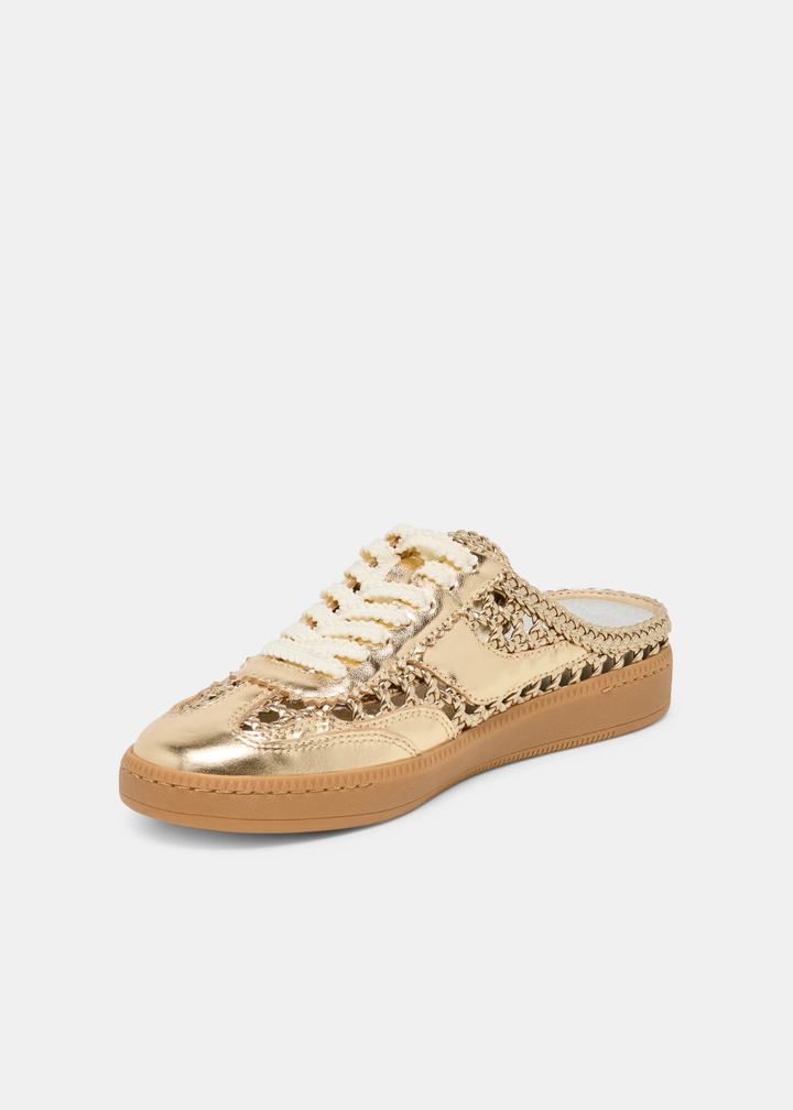 Gold woven slip on sneaker against a white background