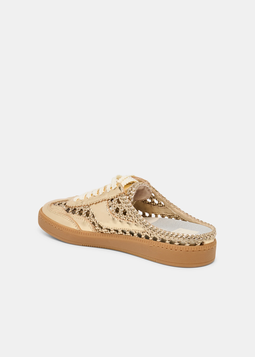 Gold woven slip on sneaker against a white background
