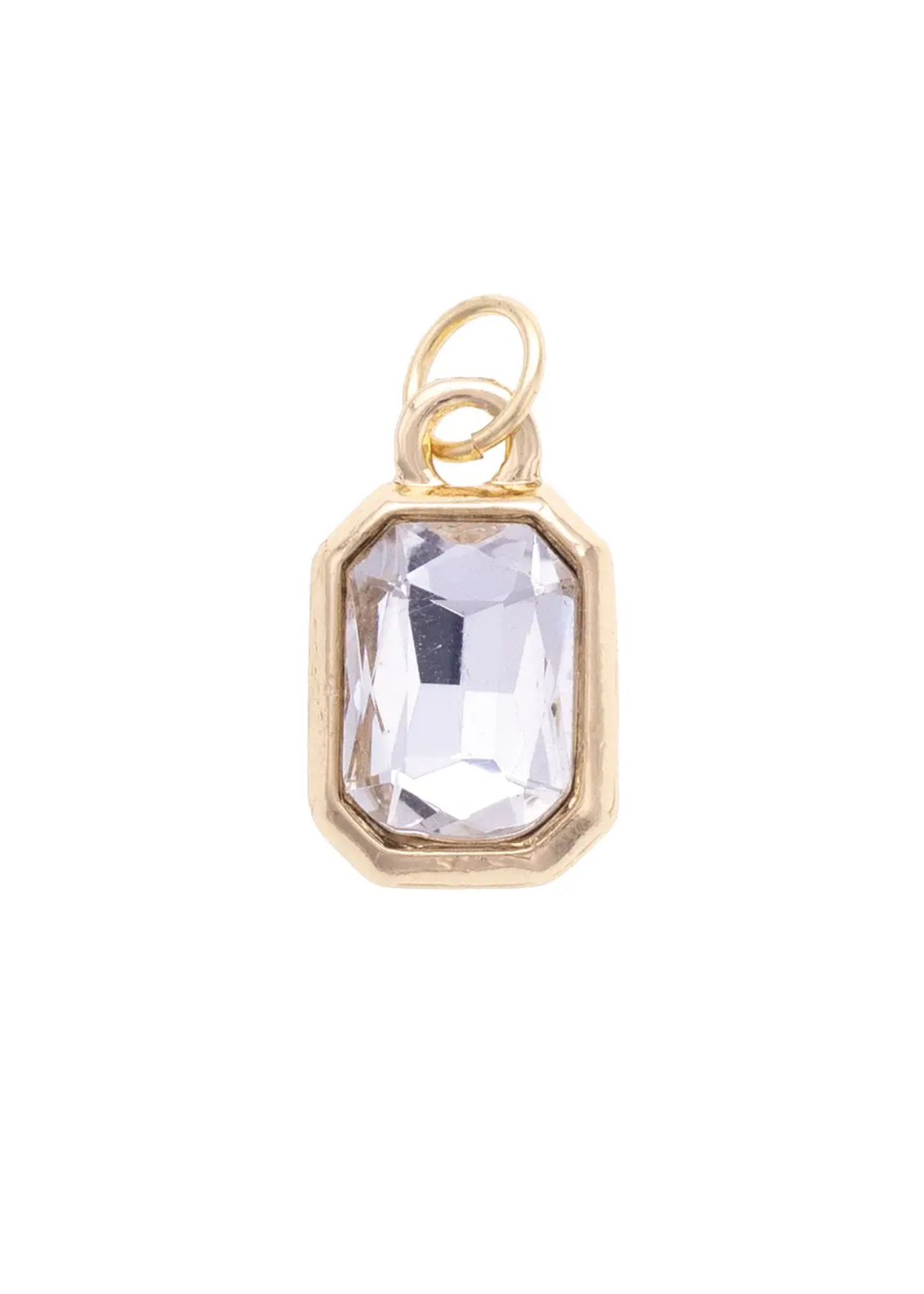 Gold framed emerald shaped charm with a clear stone on a white background