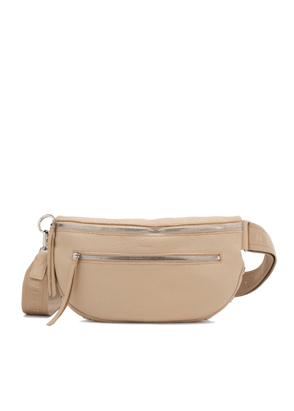 Women's tan crossbody purse with silver zippers on a white background
