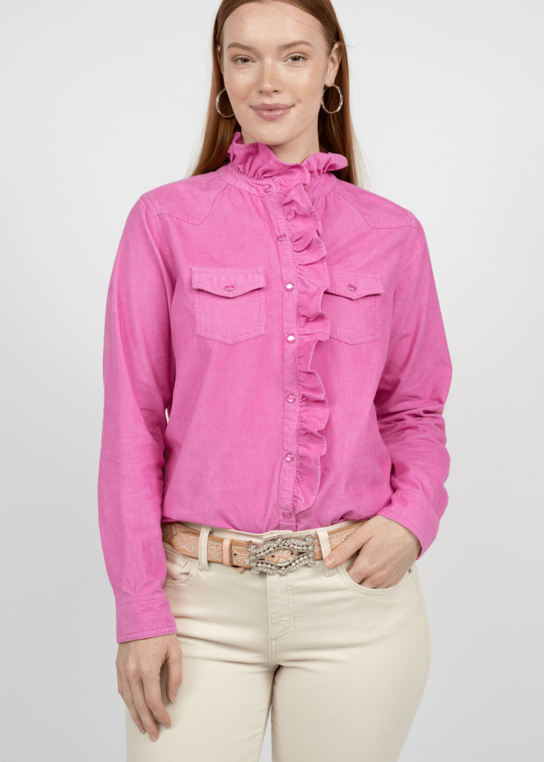 washed pink long sleeve button down with ruffle collar and ruffles down front with flap pockets