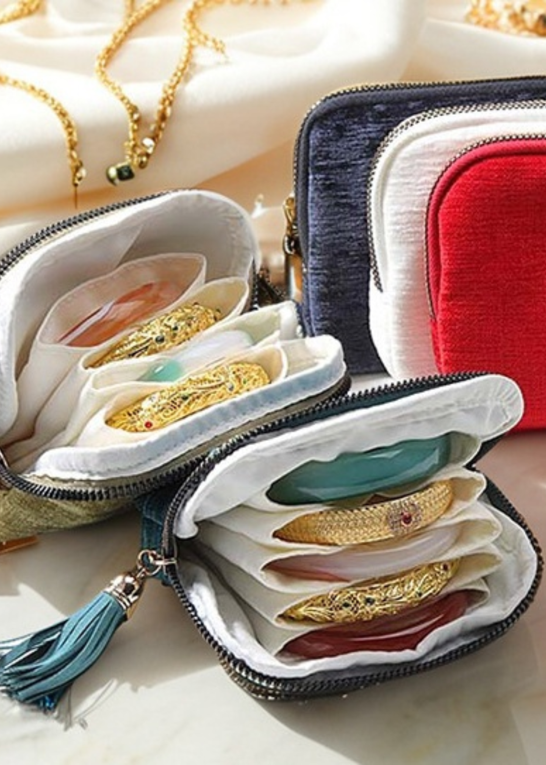 Inside of a jewelry organizer with bracelets in the pockets