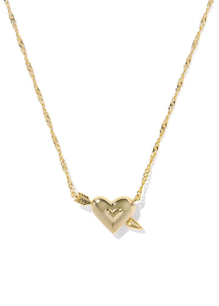 Gold necklace with a gold arrow heart pendant against a white background