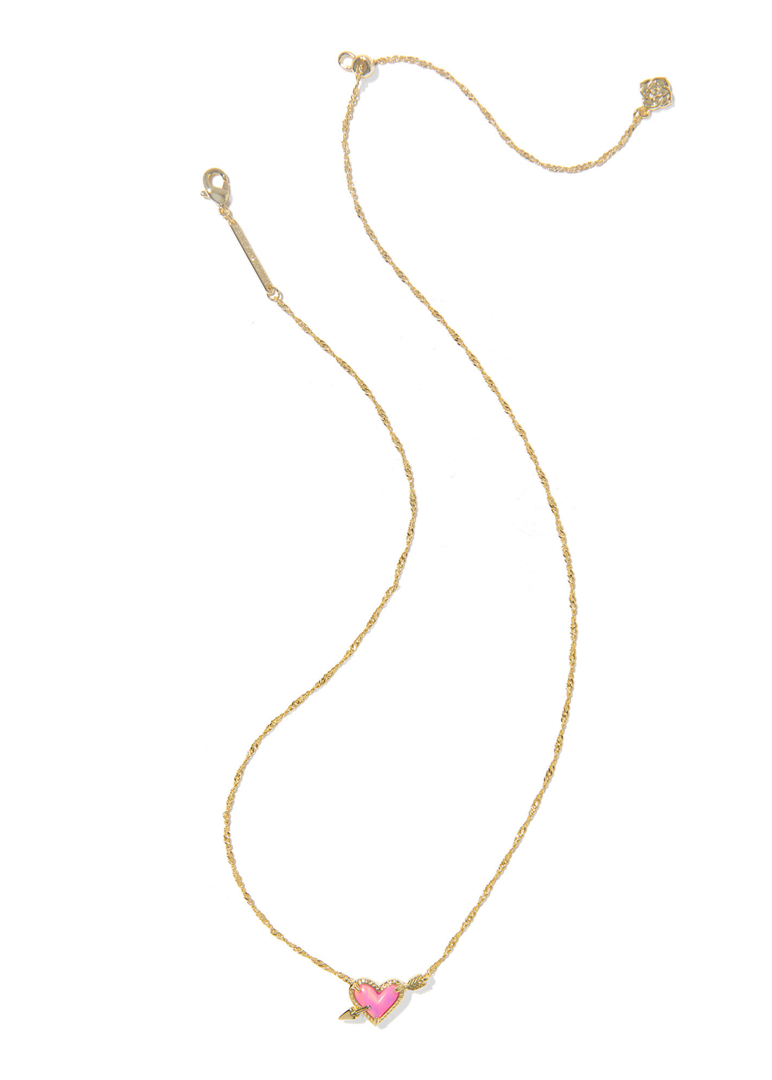 Gold necklace with a pink arrow heart pendant against a white background