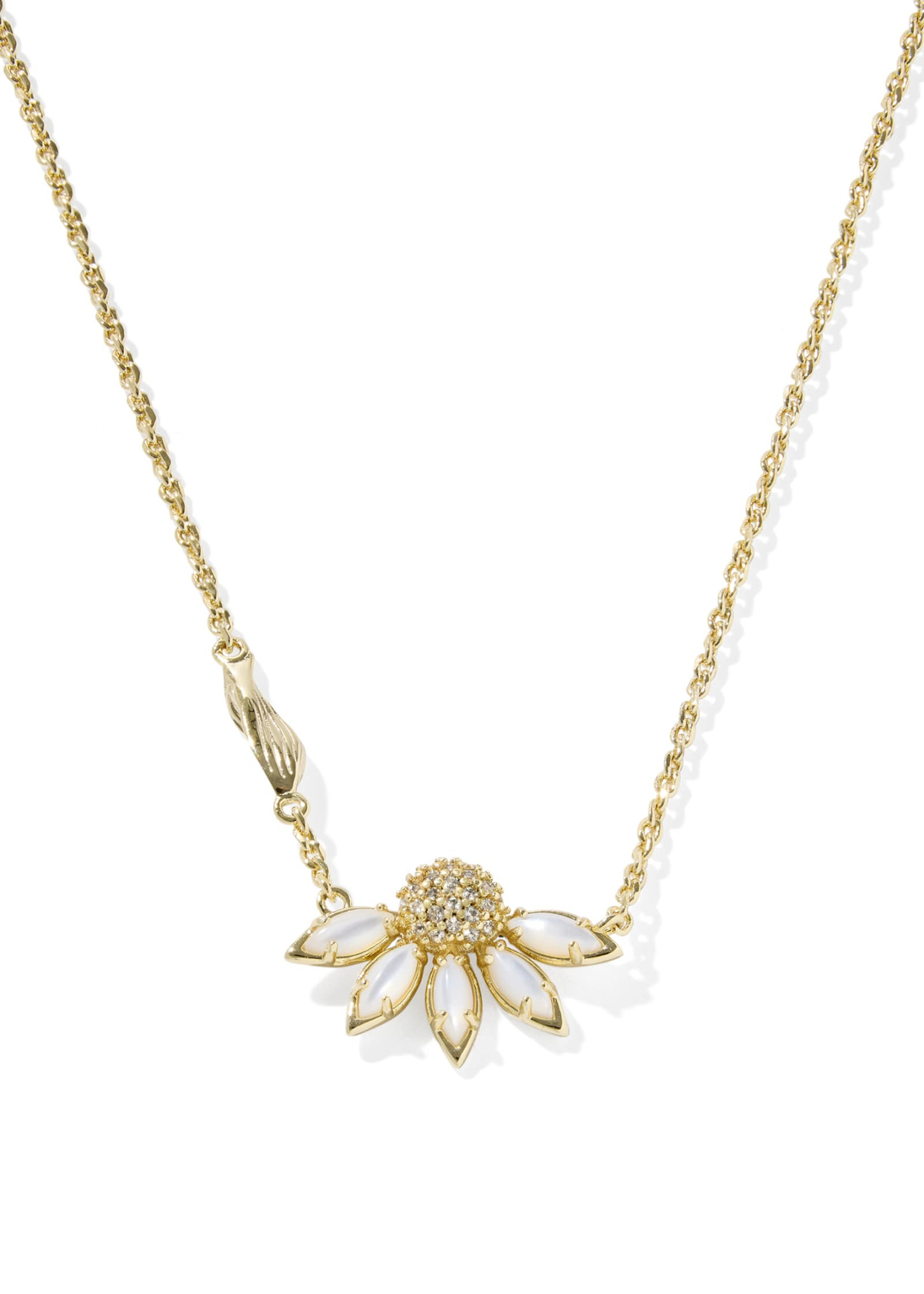 Gold necklace with an ivory flower pendant