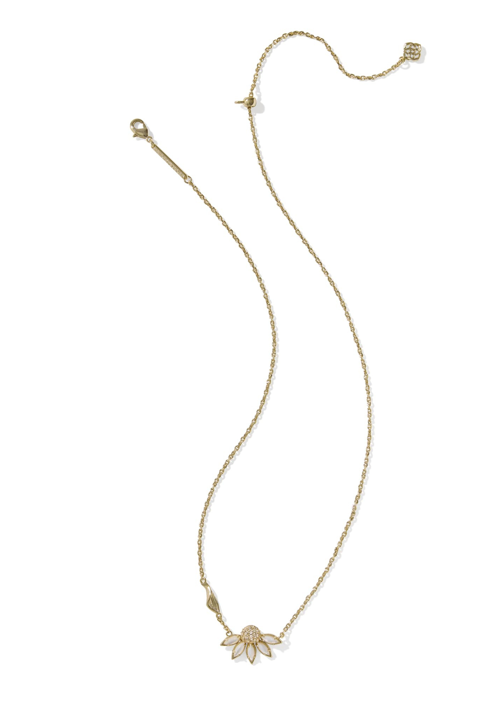 Gold necklace with an ivory flower pendant