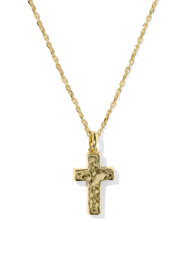 Gold cross pendant on a gold chain necklace on a white background
