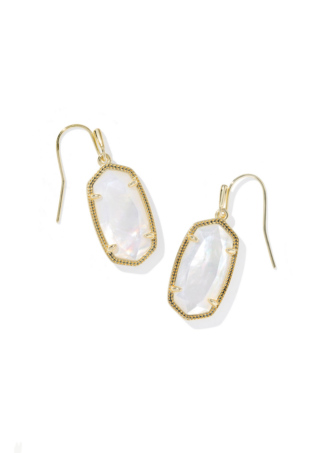 Women's gold framed drop earrings with an ivory mother of pearl center stone on a white background