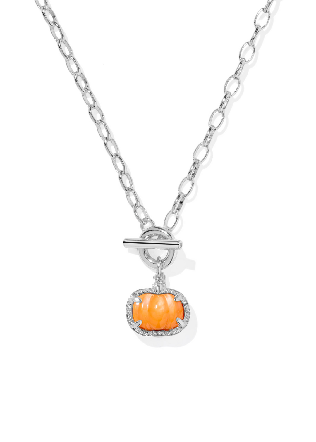 Rhodium link and chain necklace with an orange pumpkin shaped pendant framed in rhodium on a white background
