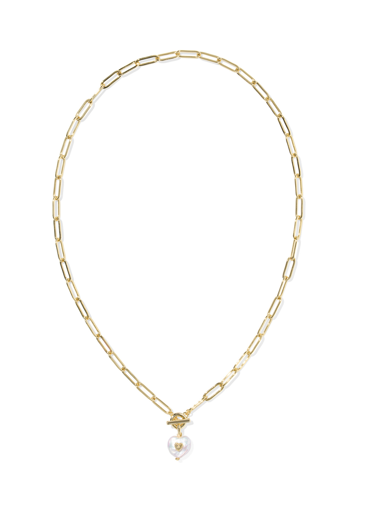 Gold chain necklace with a heart shaped pearl pendant on a white background
