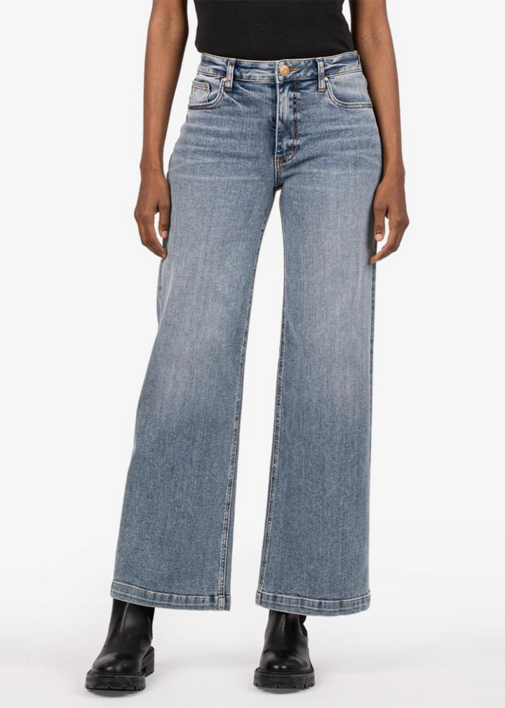 light wash wide leg jeans with roll crop at ankles