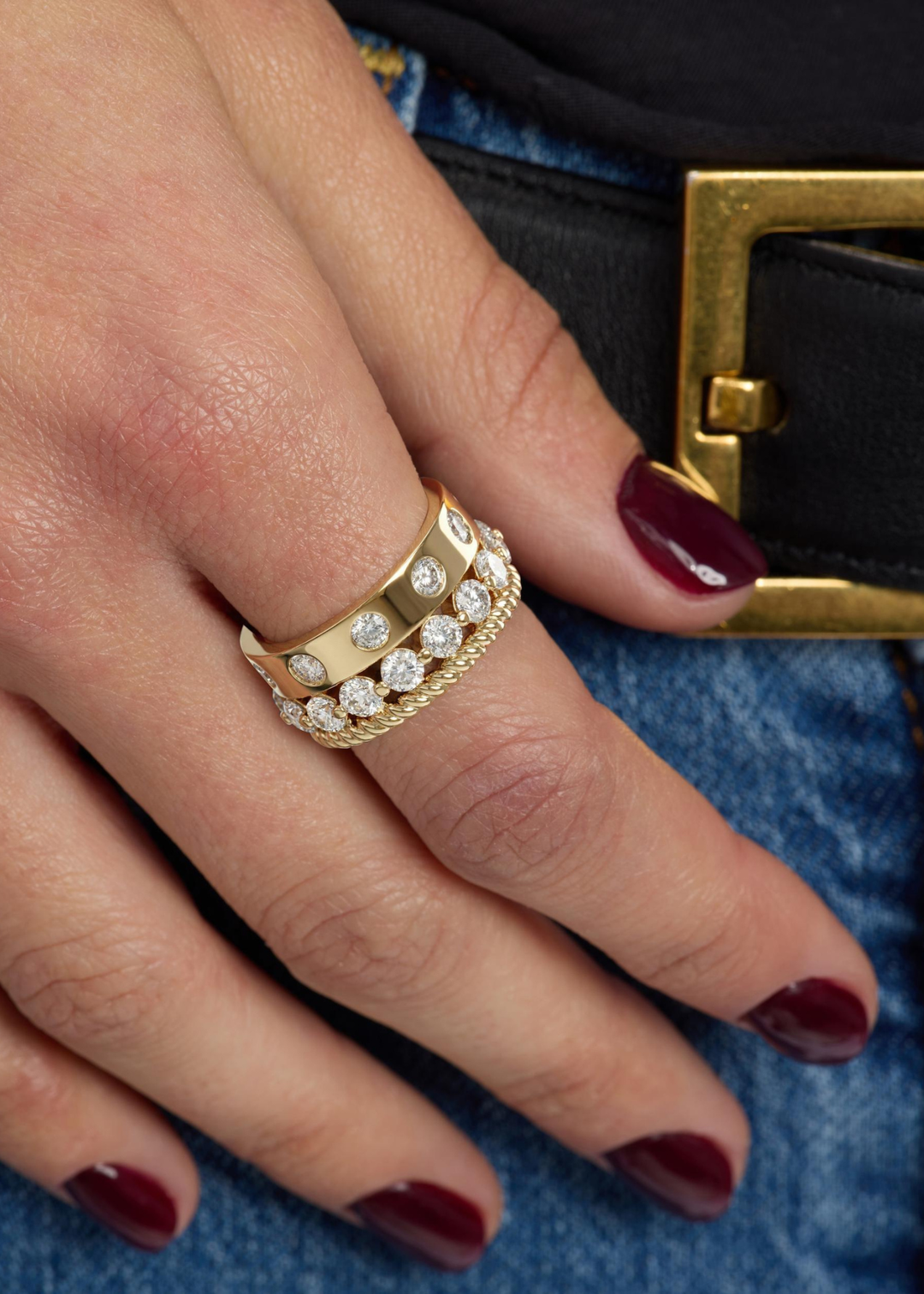 Woman wearing a gold and CZ stacked ring