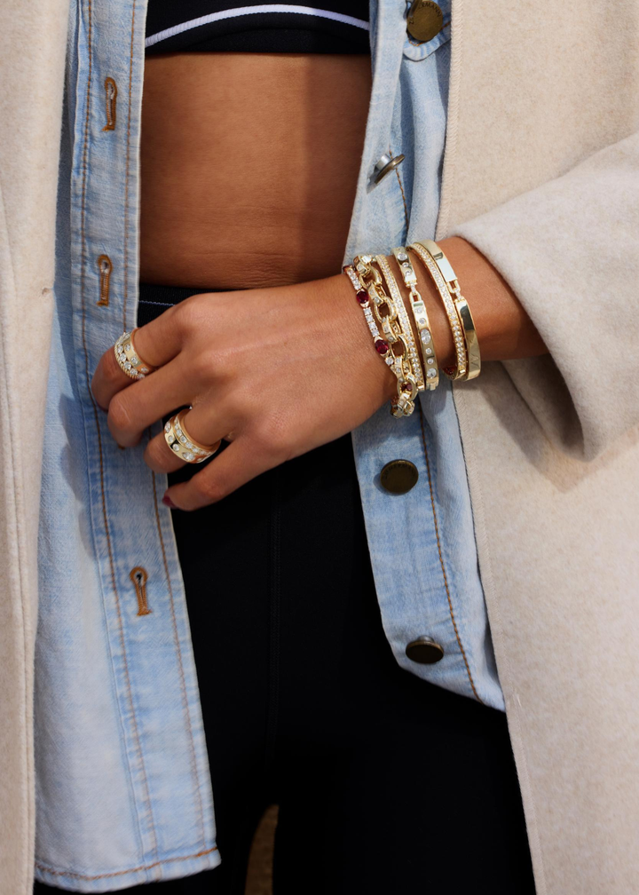 Woman wearing a gold and CZ stacked ring