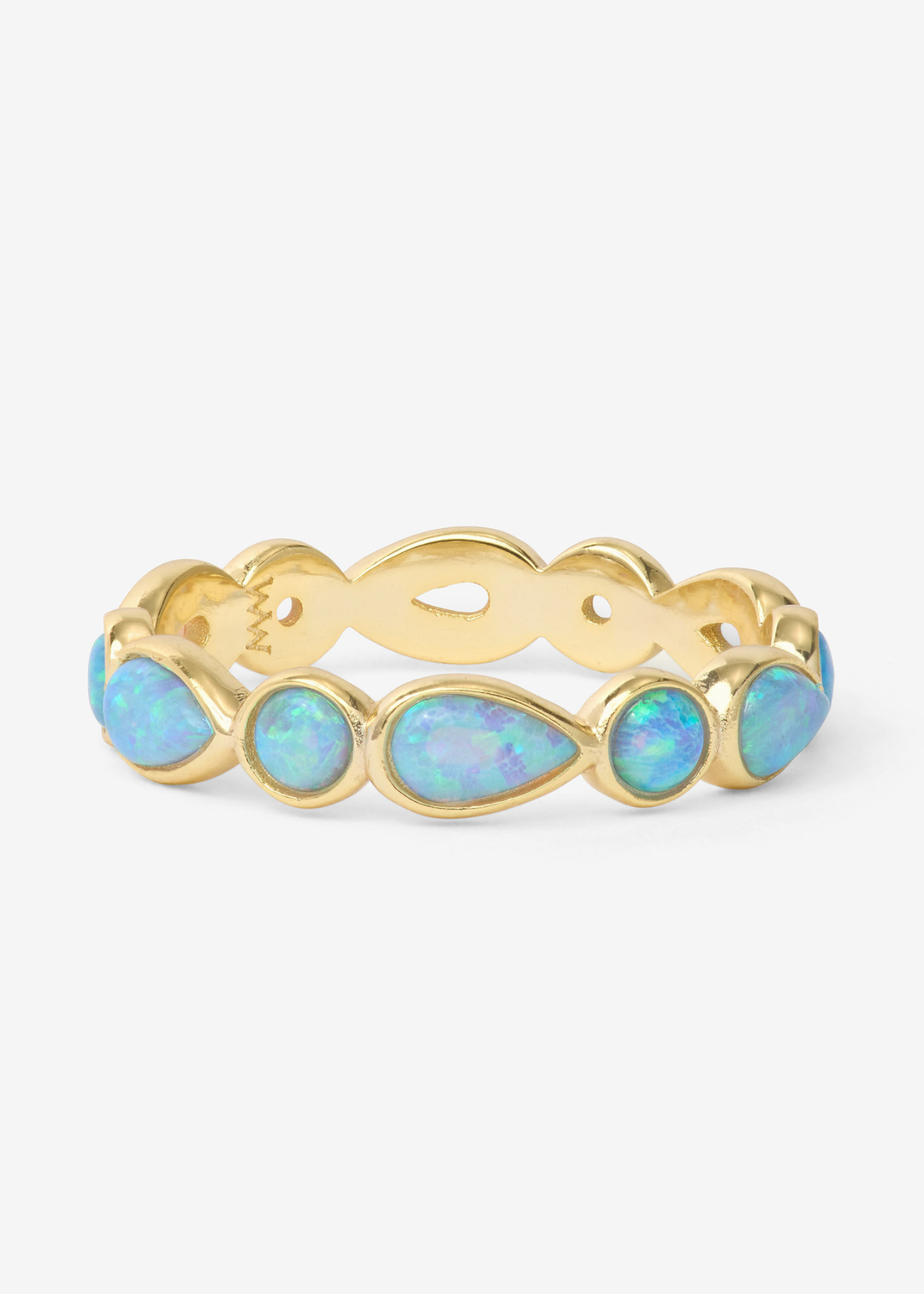 Gold ring with blue opal stones on a white background