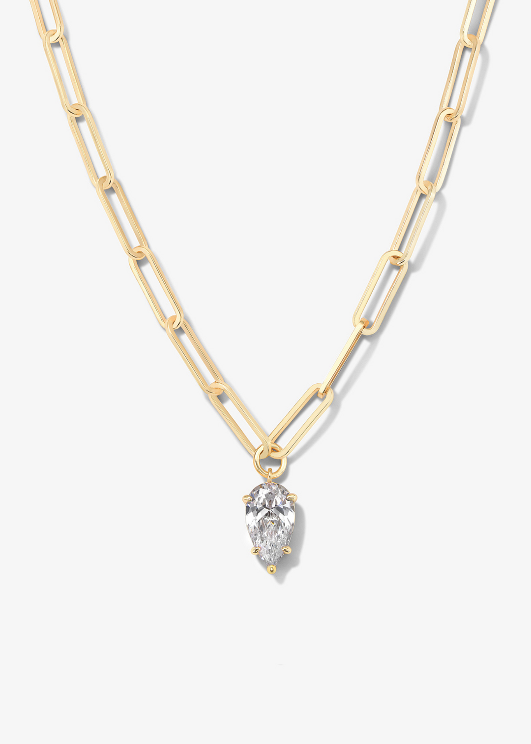 Gold chain necklace with a teardrop diamond pendant on a white background