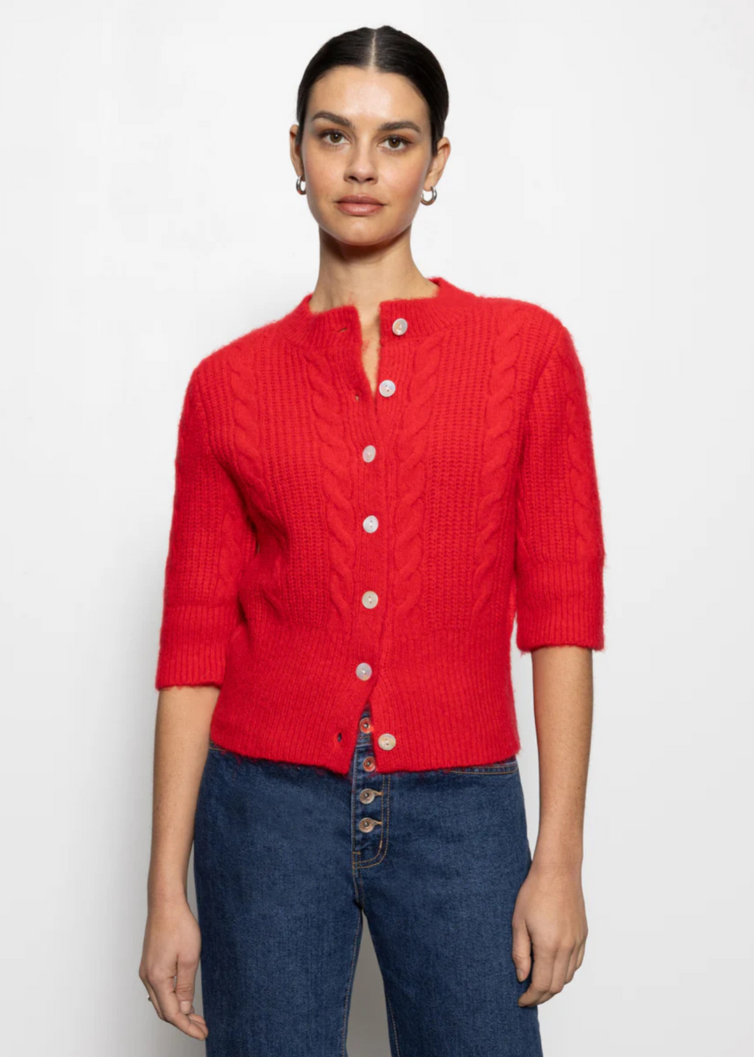 red cable knit cardigan sweater top with 1/2 sleeves and white buttons down front