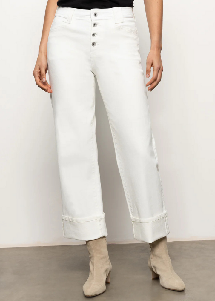 White wide leg cuffed jeans with silver button closure