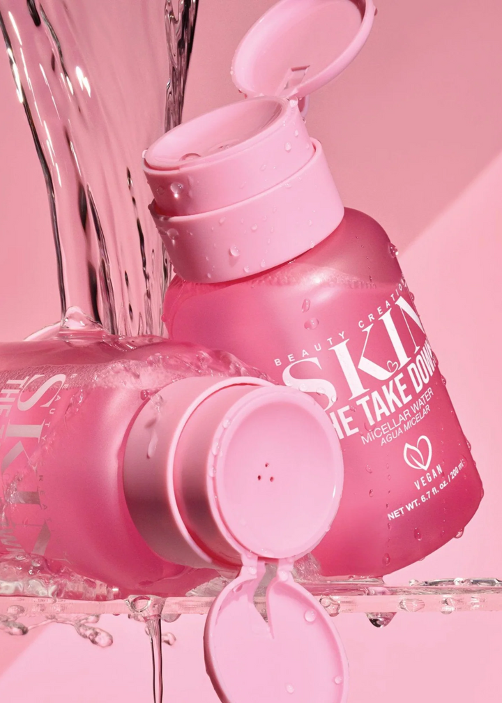 Pink makeup remover bottles