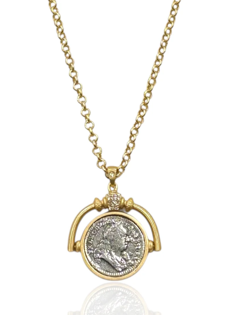 Gold necklace with a spinner and vintage coin pendant