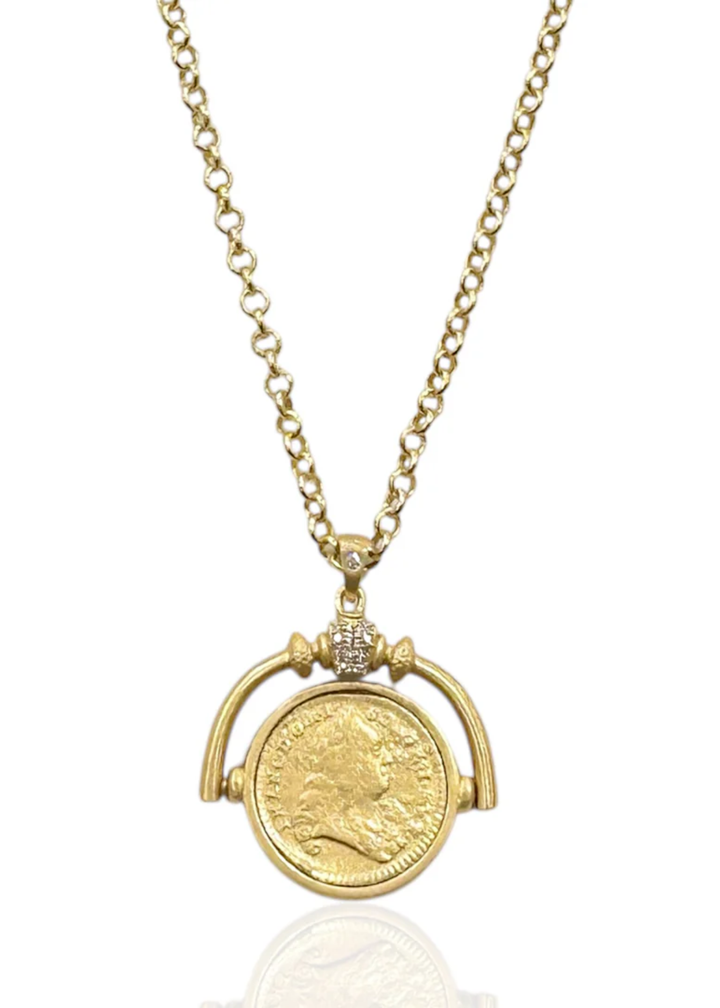 Gold necklace with a spinner and vintage coin pendant