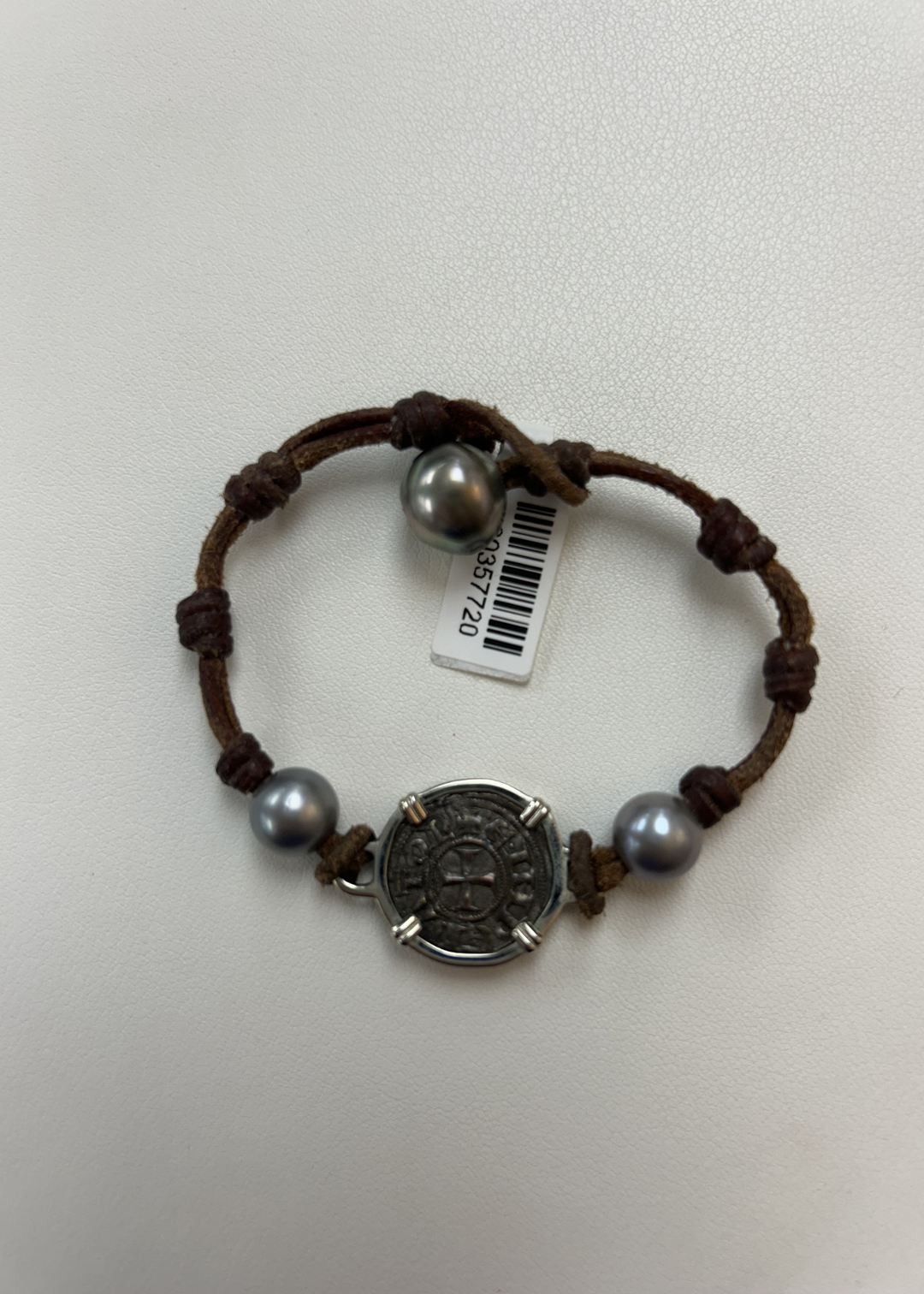 Brown leather, coin, and pearl bracelet