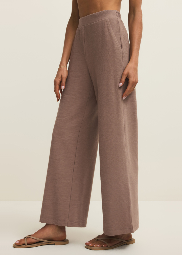 Woman wearing brown knit wide leg pants