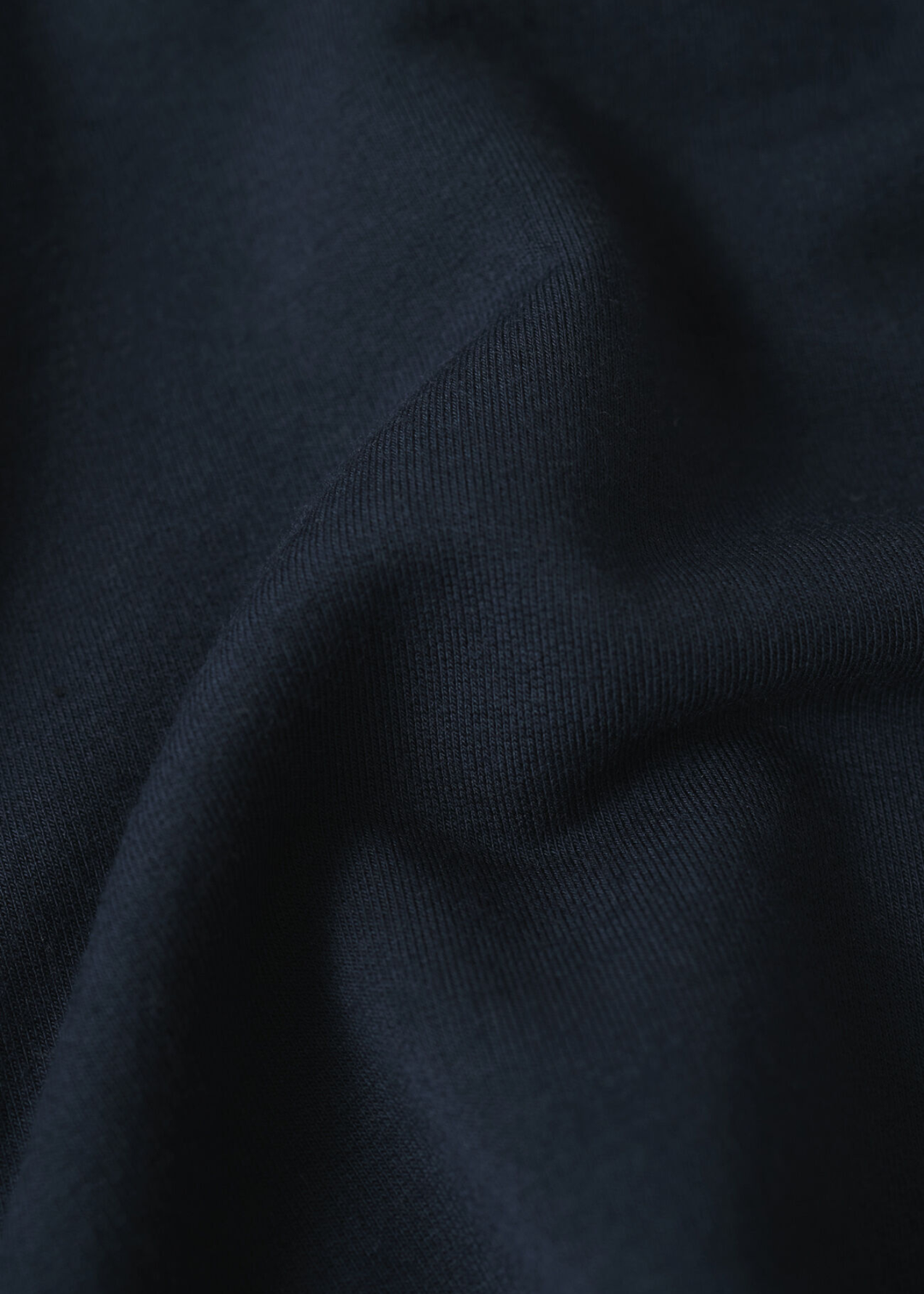 Close up of navy blue fabric