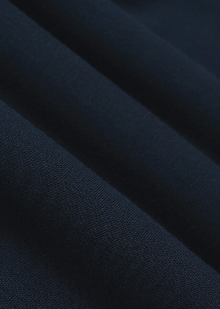 Close up of dark blue navy fabric