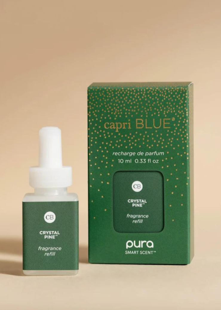 Capri Blue Pura Diffuser Refill in Crystal Pine scent, featuring a fresh pine fragrance refill bottle and packaging.