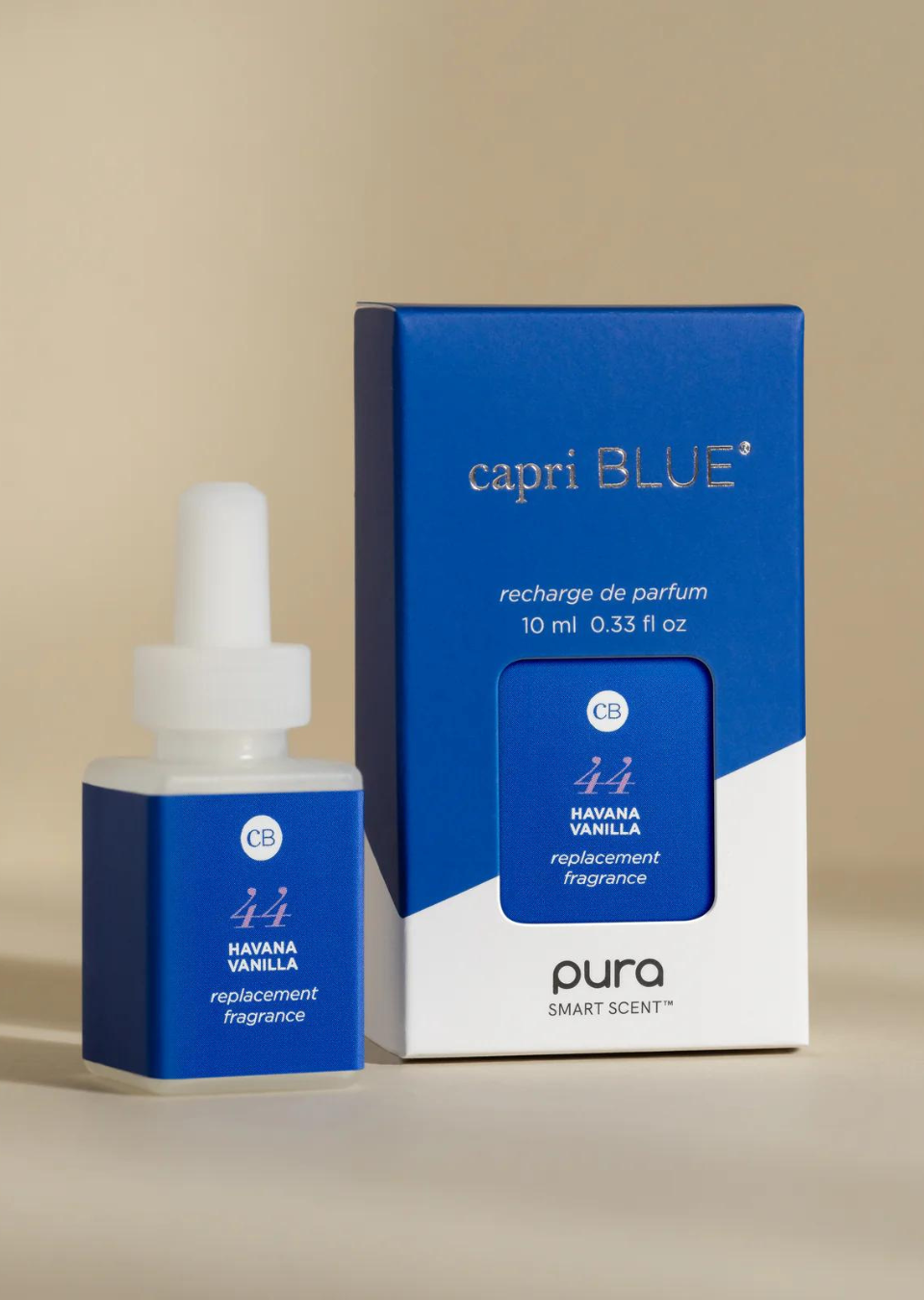 Capri Blue Pura Diffuser Refill in Volcano scent, featuring a tropical fragrance refill bottle and packaging.