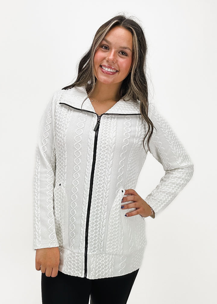 Women's Dolcezza Lola jacket in off-white, featuring a cable knit texture and black zipper accent, offering a stylish contrast and cozy fit.