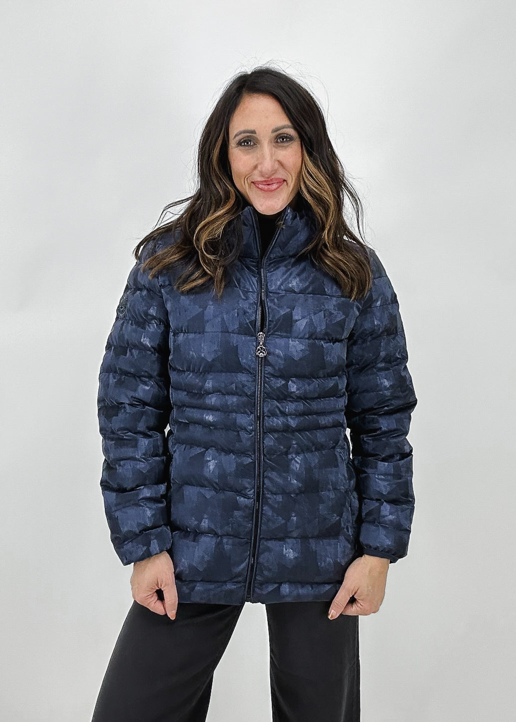 Women's woven fitted winter jacket in blue by Dolcezza, featuring a zip-front closure and quilted design for extra warmth.