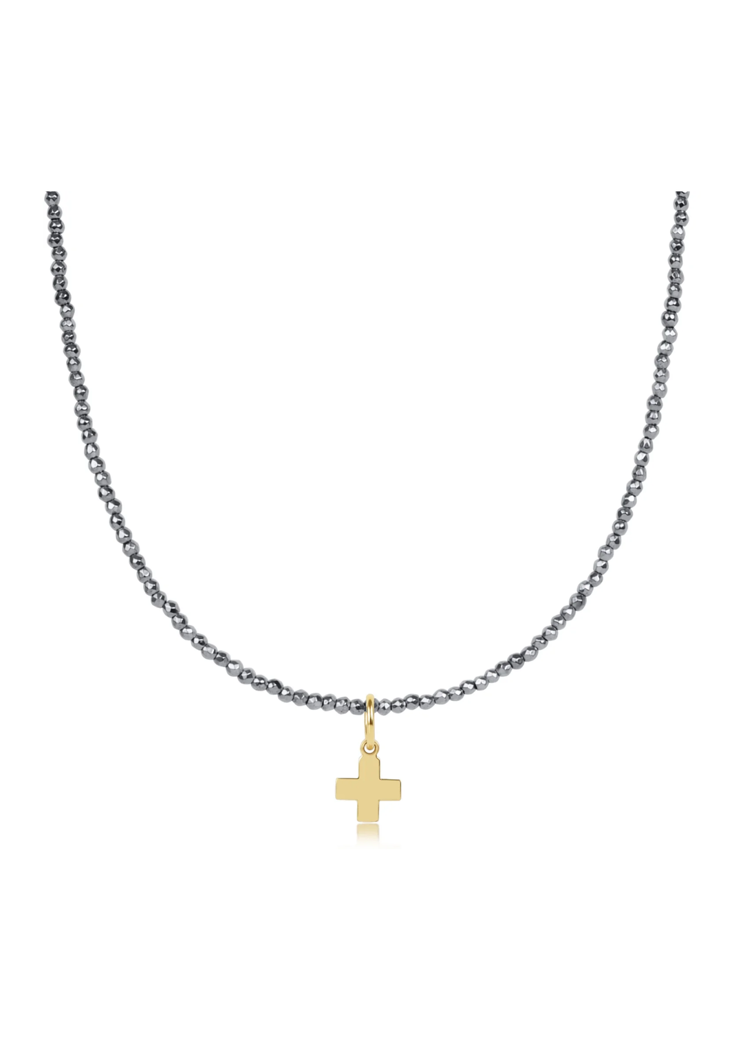 Silver faceted hematite beaded necklace with a gold cross charm on a white background
