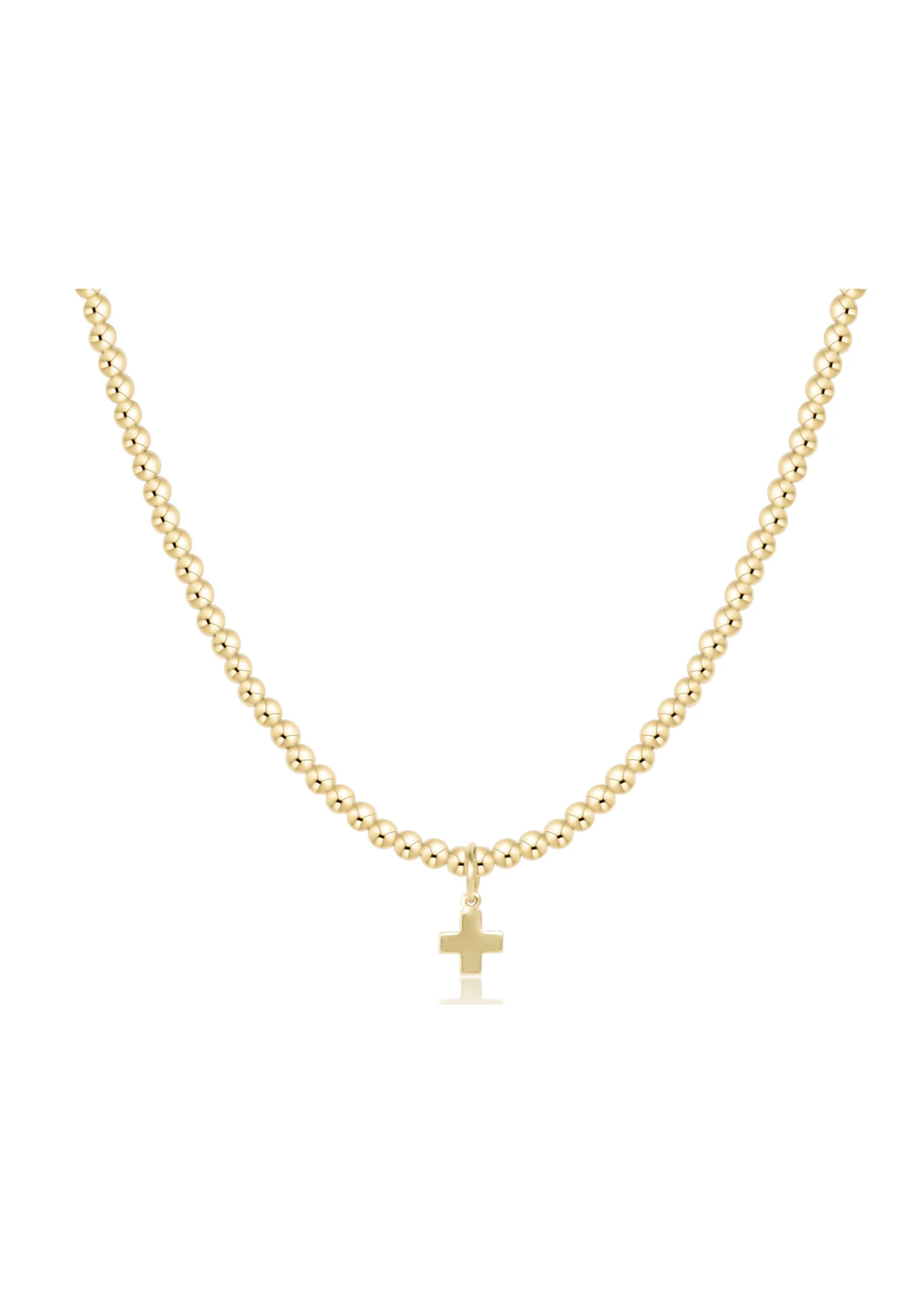 Gold beaded necklace with a small gold cross charm on a white background