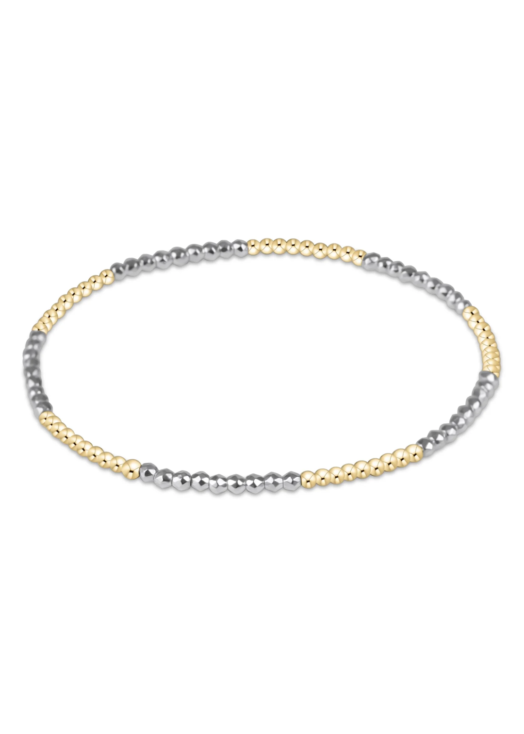 Gold and bright silver beaded bracelet on a white background