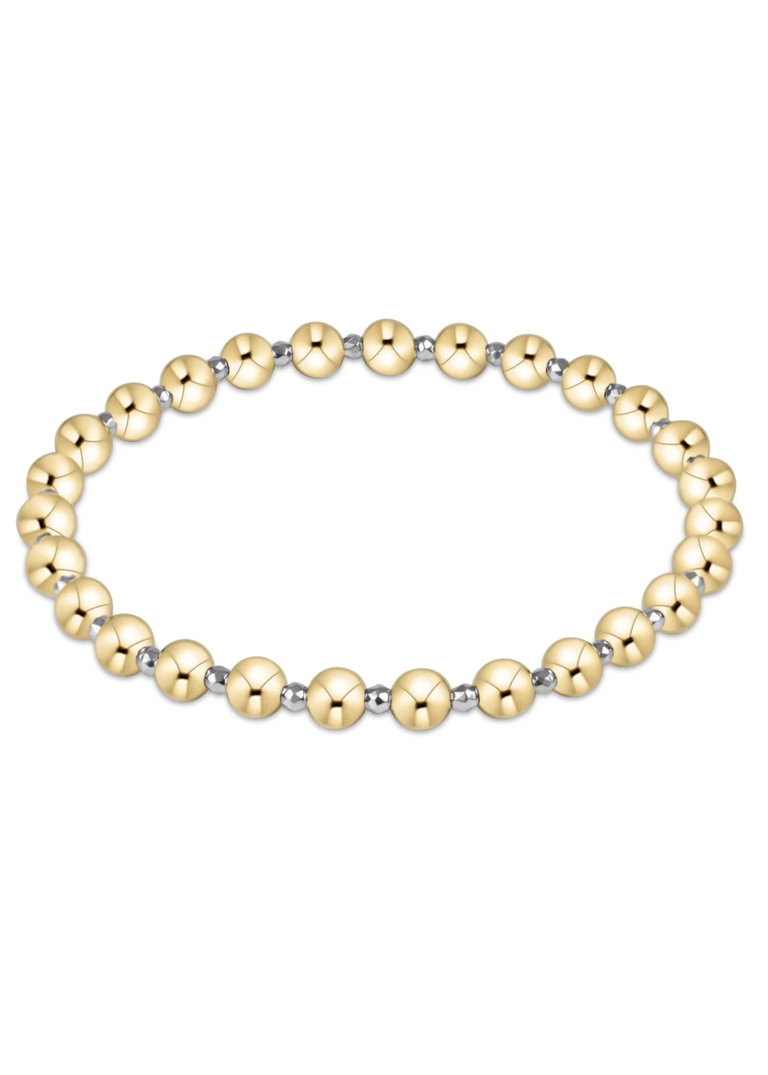 Small bright silver and large gold alternating bead bracelet on a white background