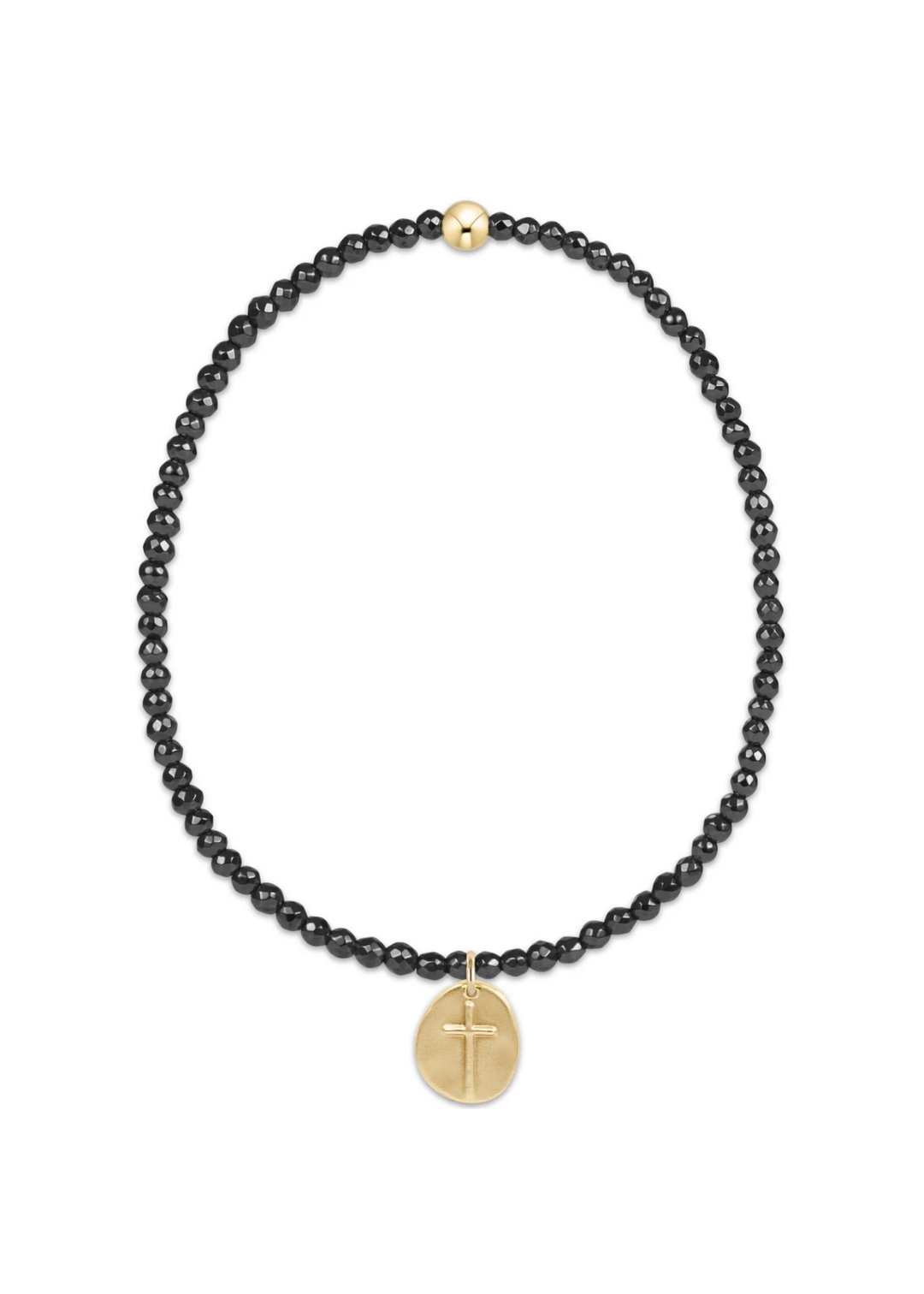 Black beaded bracelet with a small gold cross charm on a white background