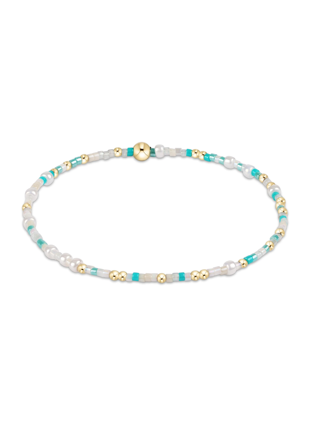 White, gold, and turquoise beaded bracelet on a white background