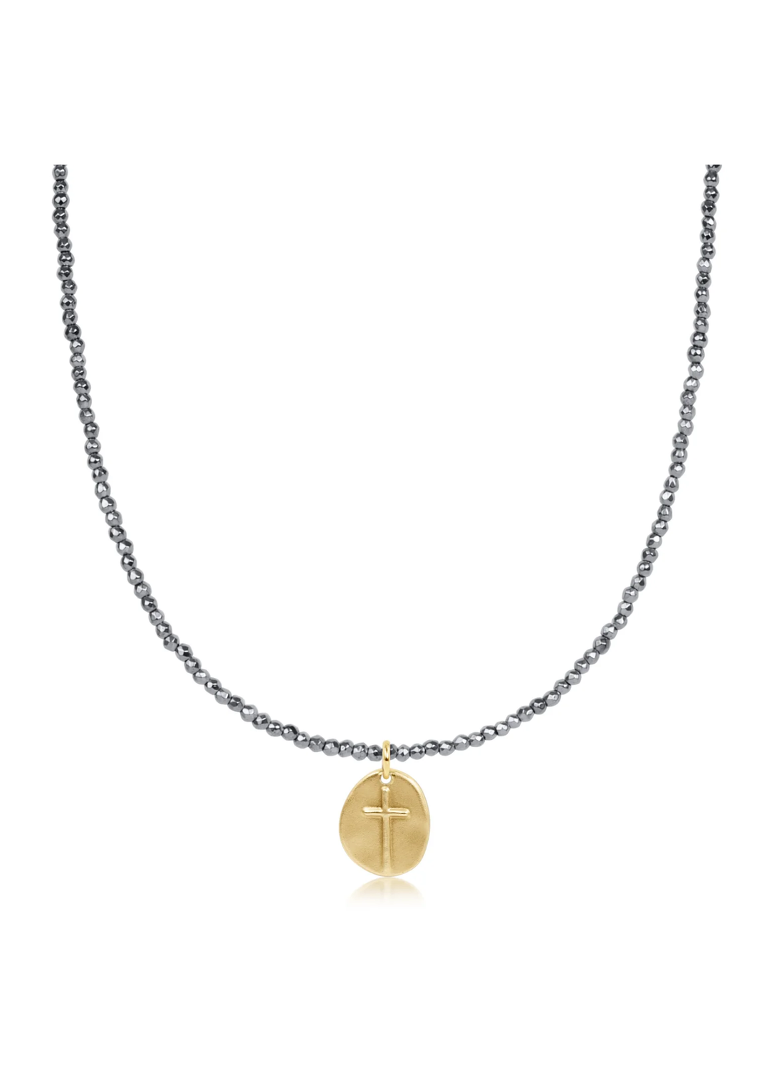 Silver beaded necklace with a gold cross charm on a white background