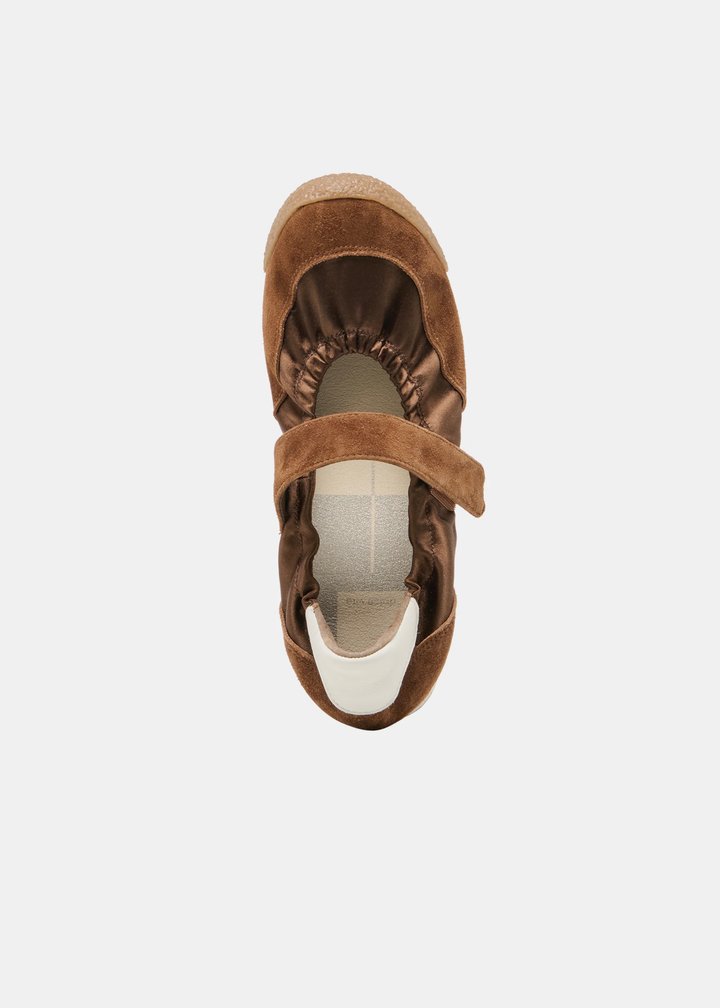 Brown sneaker/flat on a while background from above. 