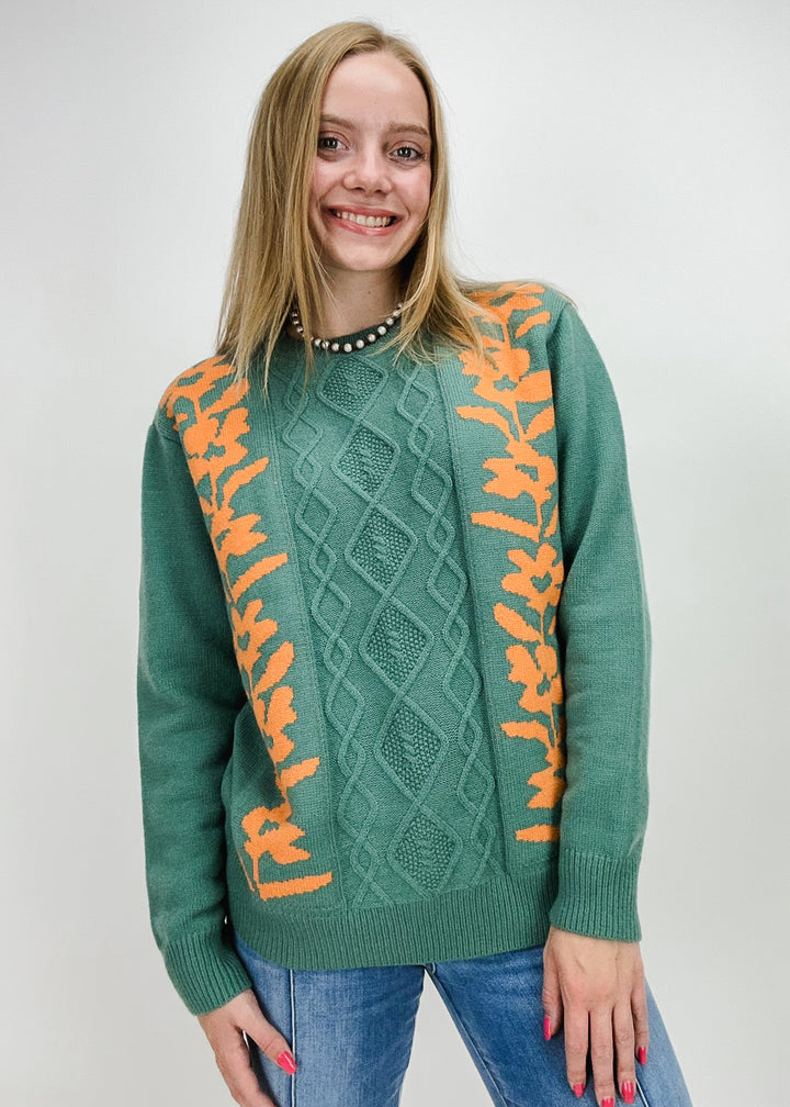 sage green cable knit sweater with orange floral 