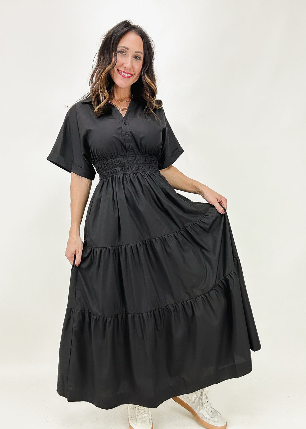 women's black maxi dress with short sleeves, collared fit, tiered maxi skirt, and cinched waistline